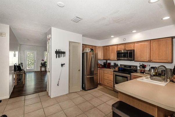 Interior, Kitchen, Recessed Lighting, Stainless Steel Appliances, Wood Texture Flooring