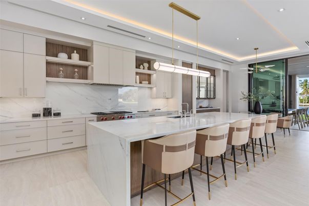 Interior, Kitchen, Marble Walls, Pendant Lights, Recessed Lighting, Stainless Steel Appliances