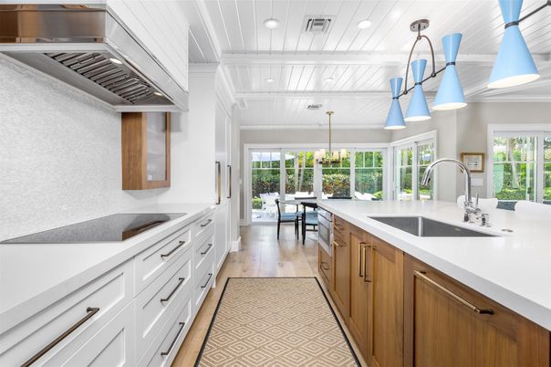 Chandelier, Dining room, Interior, Kitchen, Pendant Lights, Recessed Lighting, Stainless Steel Appliances, Wood Texture Flooring
