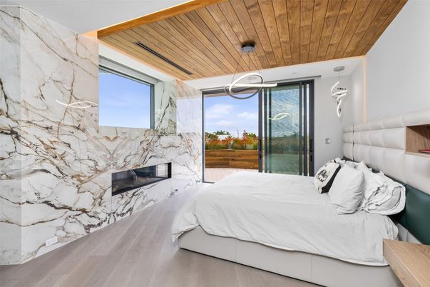 Bedroom, Fireplace, Interior, Marble Walls, Pendant Lights, Wooden Ceilings
