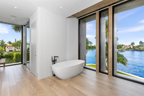 Bathroom, Free Standing Baths, Interior, Recessed Lighting, Water, Wood Texture Flooring
