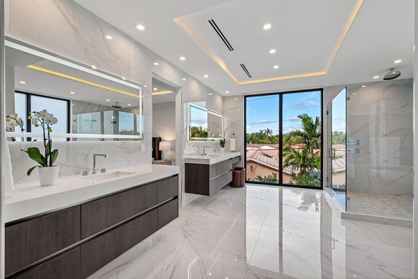 Bathroom, Dual Sink Vanities, Glass Shower, Interior, Marble, Marble Walls, Recessed Lighting