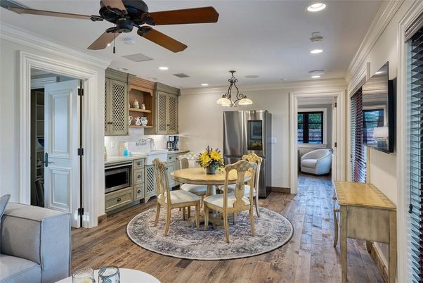 Dining room, Interior, Kitchen, Pendant Lights, Recessed Lighting, Stainless Steel Appliances, Wood Texture Flooring