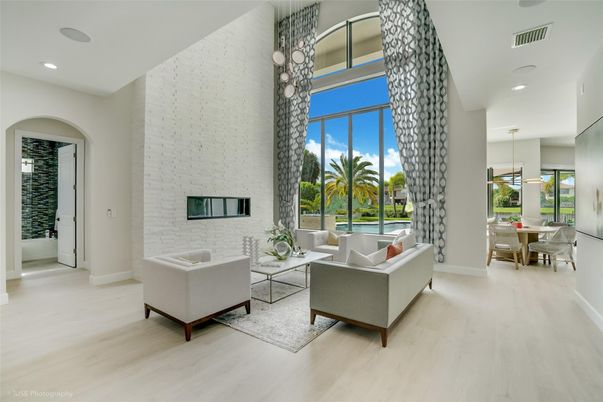 Dining room, Fireplace, Interior, Living room, Pendant Lights, Recessed Lighting, Stone Walls, Wood Texture Flooring
