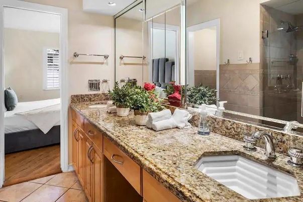 Bathroom, Dual Sink Vanities, Glass Shower, Interior, Recessed Lighting, Wood Texture Flooring