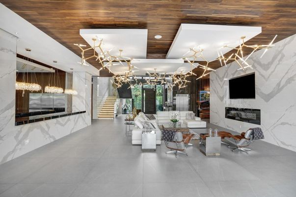 Fireplace, Interior, Living room, Marble Walls, Pendant Lights, Recessed Lighting, Wooden Ceilings