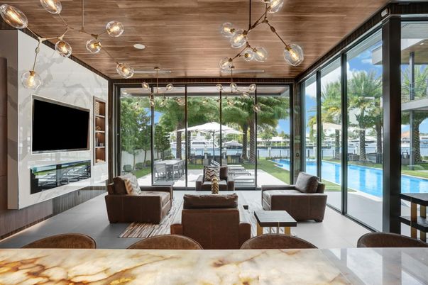 Fireplace, Interior, Living room, Pendant Lights, Sun Room, Water, Wooden Ceilings