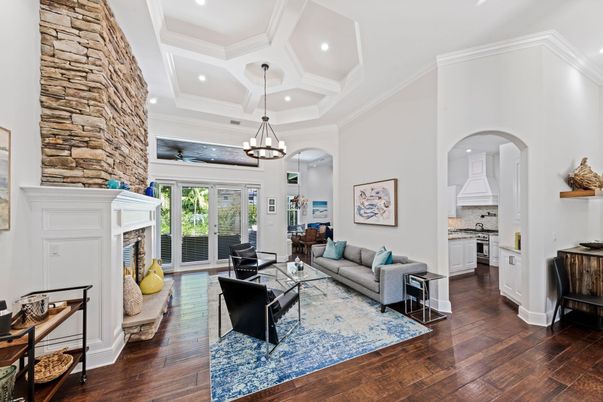 Fireplace, Interior, Living room, Pendant Lights, Recessed Lighting, Stone Walls, Wood Texture Flooring