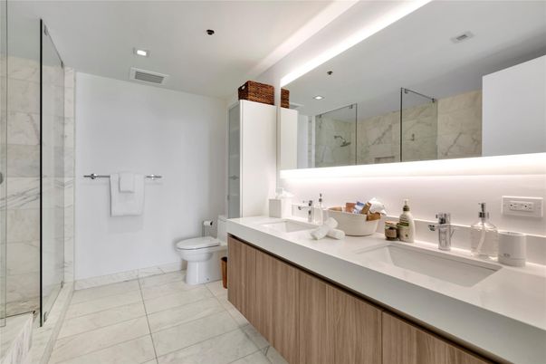 Bathroom, Dual Sink Vanities, Glass Shower, Interior, Marble Walls, Recessed Lighting