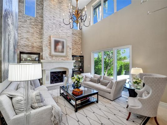 Chandelier, Fireplace, Interior, Living room, Stone Walls