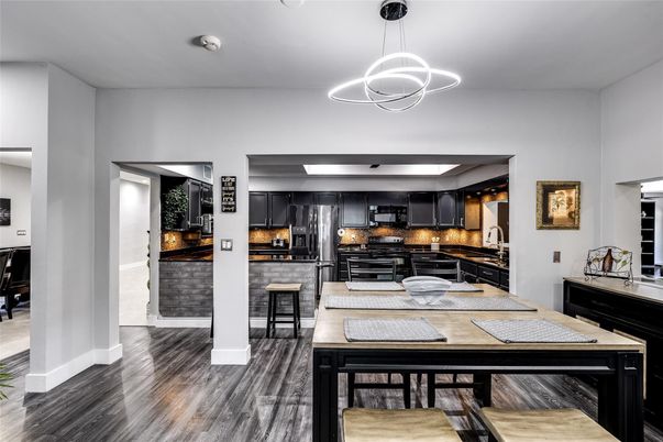 Dining room, Interior, Kitchen, Pendant Lights, Stainless Steel Appliances, Wood Texture Flooring