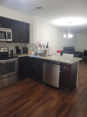 Dining room, Interior, Kitchen, Pendant Lights, Stainless Steel Appliances, Wood Texture Flooring