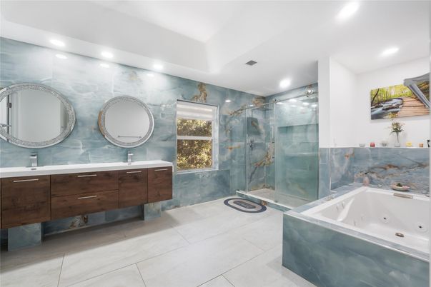 Bathroom, Dual Sink Vanities, Glass Shower, Interior, Marble Walls, Recessed Lighting