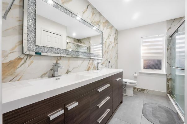 Bathroom, Dual Sink Vanities, Glass Shower, Interior, Marble Walls, Recessed Lighting