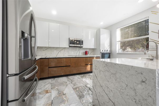 Interior, Kitchen, Marble, Marble Walls, Recessed Lighting, Stainless Steel Appliances