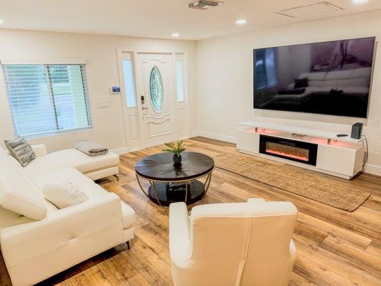 Fireplace, Interior, Living room, Recessed Lighting, Wood Texture Flooring