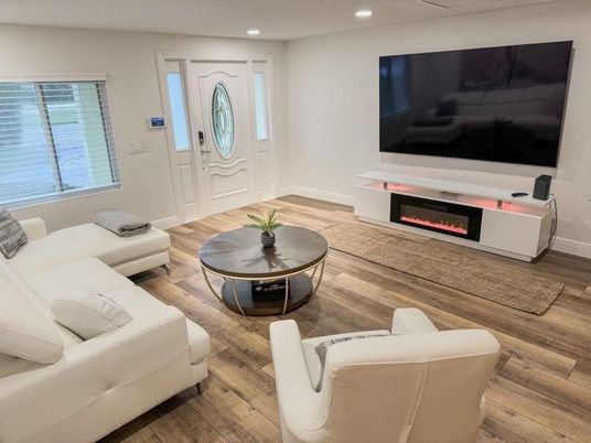 Fireplace, Interior, Living room, Recessed Lighting, Wood Texture Flooring