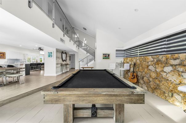 Billiard Table, Game Room, Interior, Pendant Lights, Recessed Lighting, Stone Walls, Wood Texture Flooring