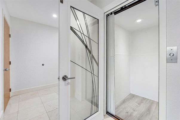 Elevator, Interior, Recessed Lighting, Wood Texture Flooring