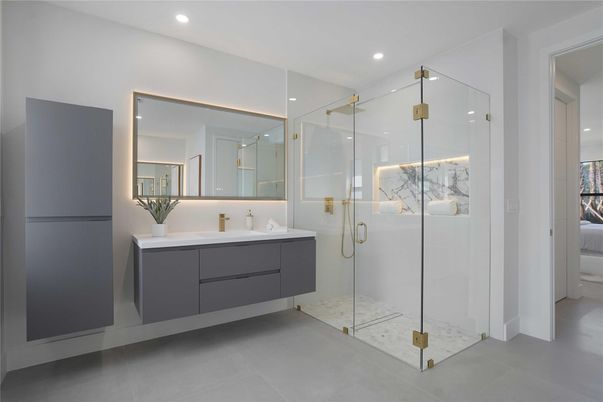 Bathroom, Dual Sink Vanities, Glass Shower, Interior, Marble Walls, Recessed Lighting
