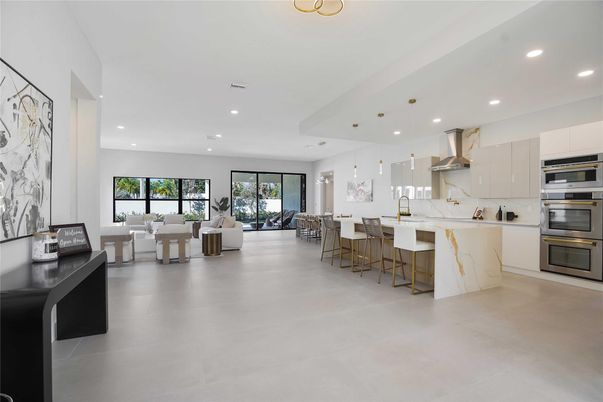Dining room, Interior, Kitchen, Living room, Marble Walls, Pendant Lights, Recessed Lighting, Stainless Steel Appliances