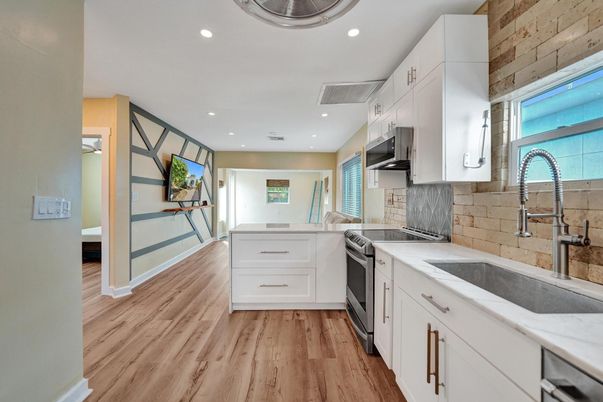 Interior, Kitchen, Recessed Lighting, Stainless Steel Appliances, Stone Walls, Wood Texture Flooring