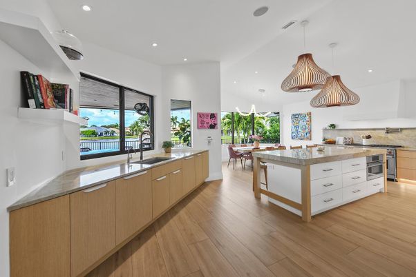 Dining room, Interior, Kitchen, Pendant Lights, Recessed Lighting, Stainless Steel Appliances, Wood Texture Flooring