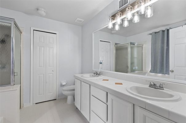 Bathroom, Dual Sink Vanities, Glass Shower, Interior, Tile Countertops