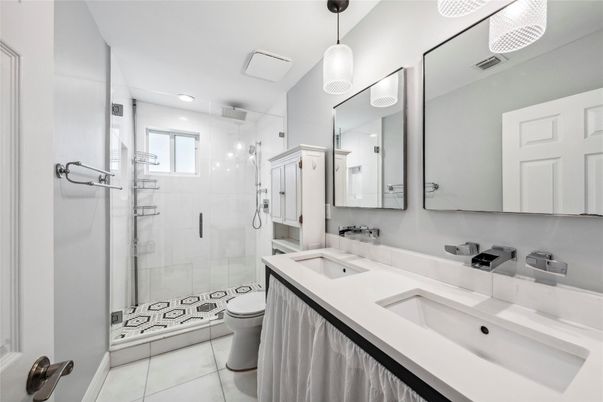 Bathroom, Dual Sink Vanities, Glass Shower, Interior, Pendant Lights, Recessed Lighting