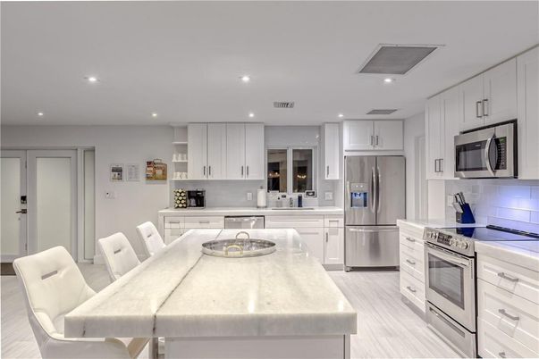 Dining room, Interior, Kitchen, Recessed Lighting, Stainless Steel Appliances, Wood Texture Flooring