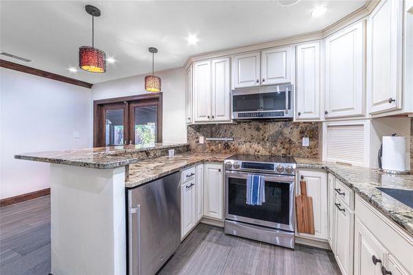 Interior, Kitchen, Pendant Lights, Recessed Lighting, Stainless Steel Appliances, Wood Texture Flooring