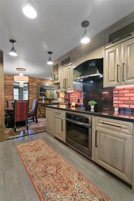 Dining room, Interior, Kitchen, Pendant Lights, Stainless Steel Appliances, Wood Texture Flooring