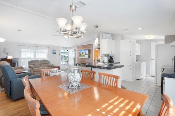Chandelier, Dining room, Interior, Kitchen, Living room, Pendant Lights, Recessed Lighting, Wood Texture Flooring