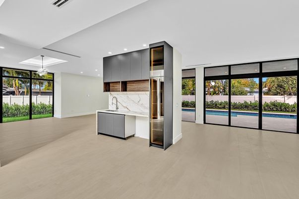 Interior, Kitchen, Marble Walls, Pendant Lights, Recessed Lighting, Wood Texture Flooring