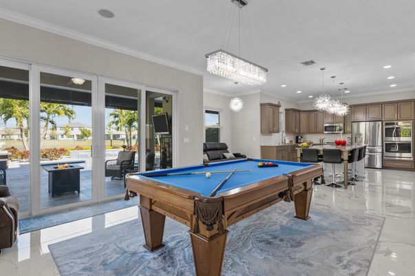 Billiard Table, Chandelier, Game Room, Interior, Kitchen, Pendant Lights, Recessed Lighting, Stainless Steel Appliances