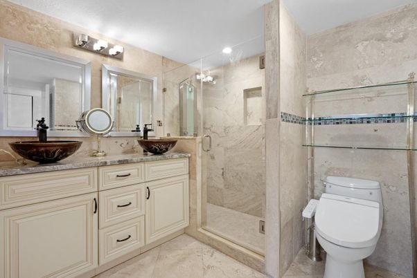Bathroom, Dual Sink Vanities, Glass Shower, Interior, Marble Walls, Recessed Lighting