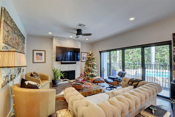 Fireplace, Interior, Living room, Recessed Lighting, Stone Walls, Wood Texture Flooring
