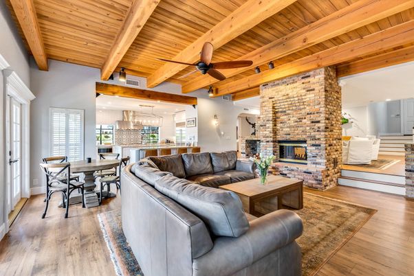 Dining room, Fireplace, Interior, Kitchen, Living room, Pendant Lights, Recessed Lighting, Stainless Steel Appliances, Stone Walls, Wooden Beams, Wooden Ceilings, Wood Texture Flooring