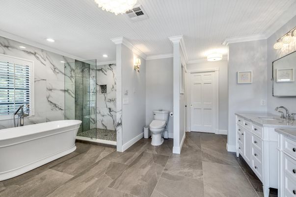 Bathroom, Dual Sink Vanities, Free Standing Baths, Glass Shower, Interior, Marble Walls, Recessed Lighting