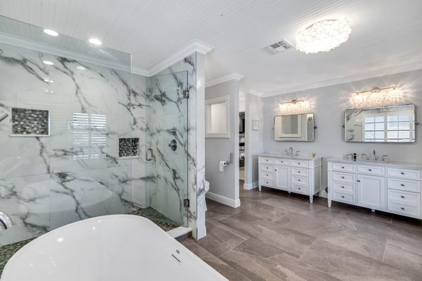 Bathroom, Chandelier, Dual Sink Vanities, Free Standing Baths, Interior, Marble Walls, Recessed Lighting