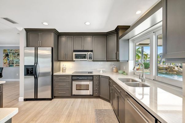 Interior, Kitchen, Recessed Lighting, Stainless Steel Appliances, Wood Texture Flooring