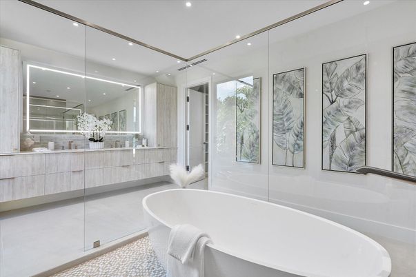 Bathroom, Dual Sink Vanities, Free Standing Baths, Glass Shower, Interior, Marble Walls, Recessed Lighting
