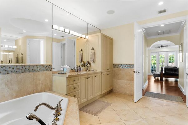 Bathroom, Dual Sink Vanities, Interior, Recessed Lighting, Wood Texture Flooring