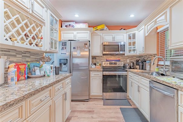 Interior, Kitchen, Recessed Lighting, Stainless Steel Appliances, Wood Texture Flooring