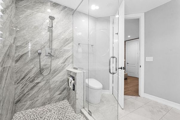 Bathroom, Glass Shower, Interior, Marble Walls, Recessed Lighting, Wood Texture Flooring