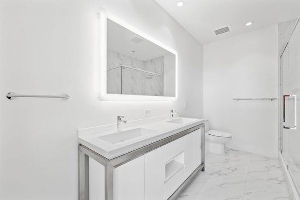 Bathroom, Dual Sink Vanities, Interior, Marble, Marble Walls, Recessed Lighting