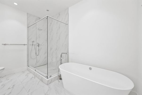 Bathroom, Free Standing Baths, Glass Shower, Interior, Marble, Marble Walls, Recessed Lighting