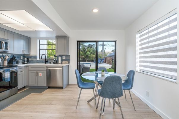 Dining room, Interior, Kitchen, Recessed Lighting, Stainless Steel Appliances, Wood Texture Flooring
