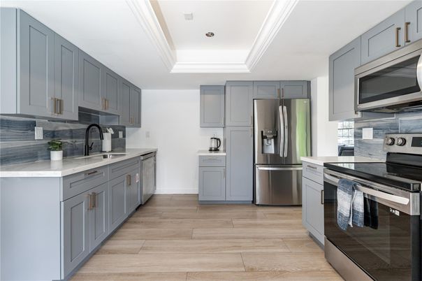 Interior, Kitchen, Recessed Lighting, Stainless Steel Appliances, Wood Texture Flooring