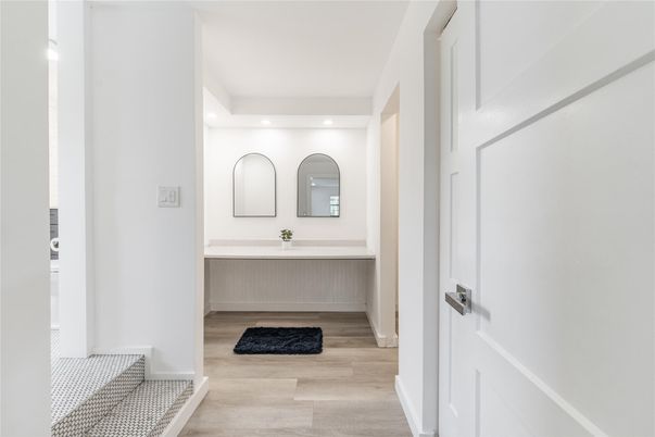 Bathroom, Dual Sink Vanities, Interior, Recessed Lighting, Wood Texture Flooring